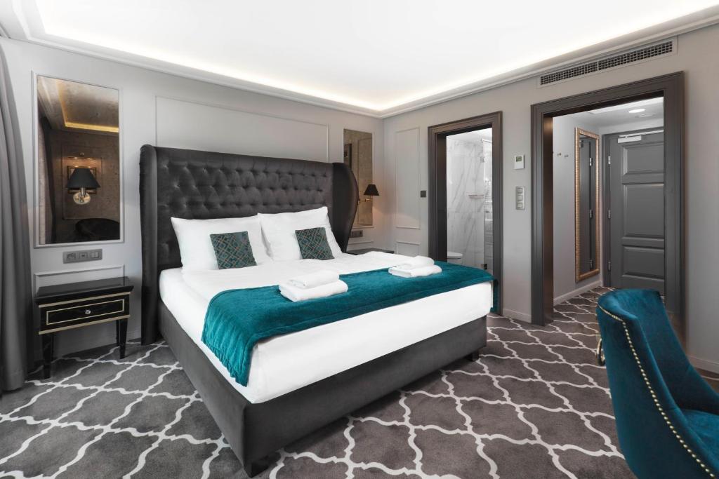 Postel nebo postele na pokoji v ubytování Hotel Zlaty Klucik - Golden Key with Luxury SPA