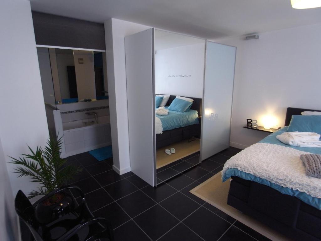 Postel nebo postele na pokoji v ubytování B&B Bianero