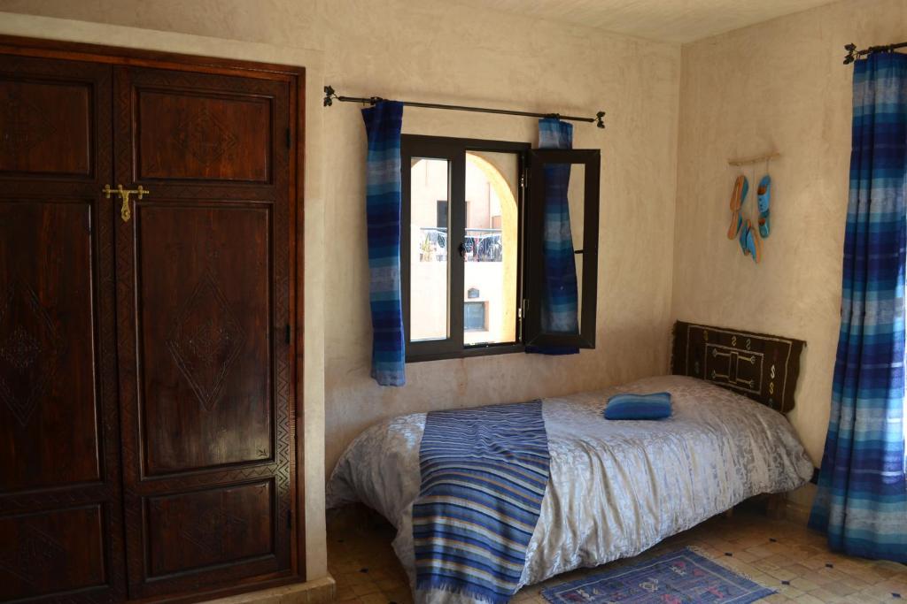 Postel nebo postele na pokoji v ubytování Riad Dar Bergui