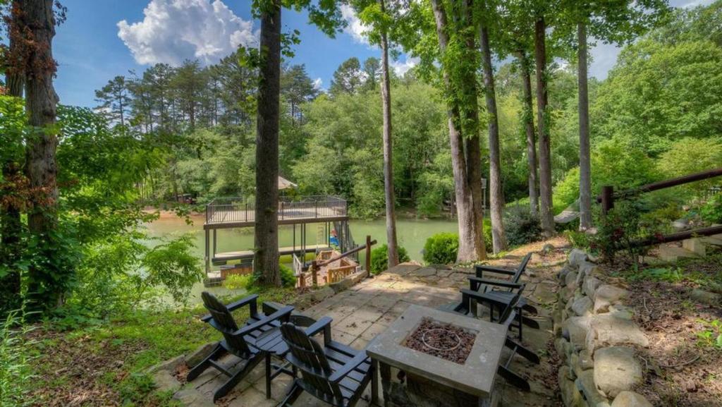 a group of picnic tables and benches in a park at Southern Comfort in Morganton