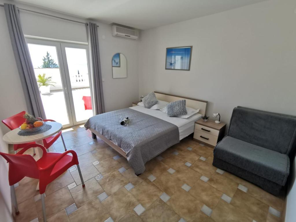 Postel nebo postele na pokoji v ubytování Villa Šimović