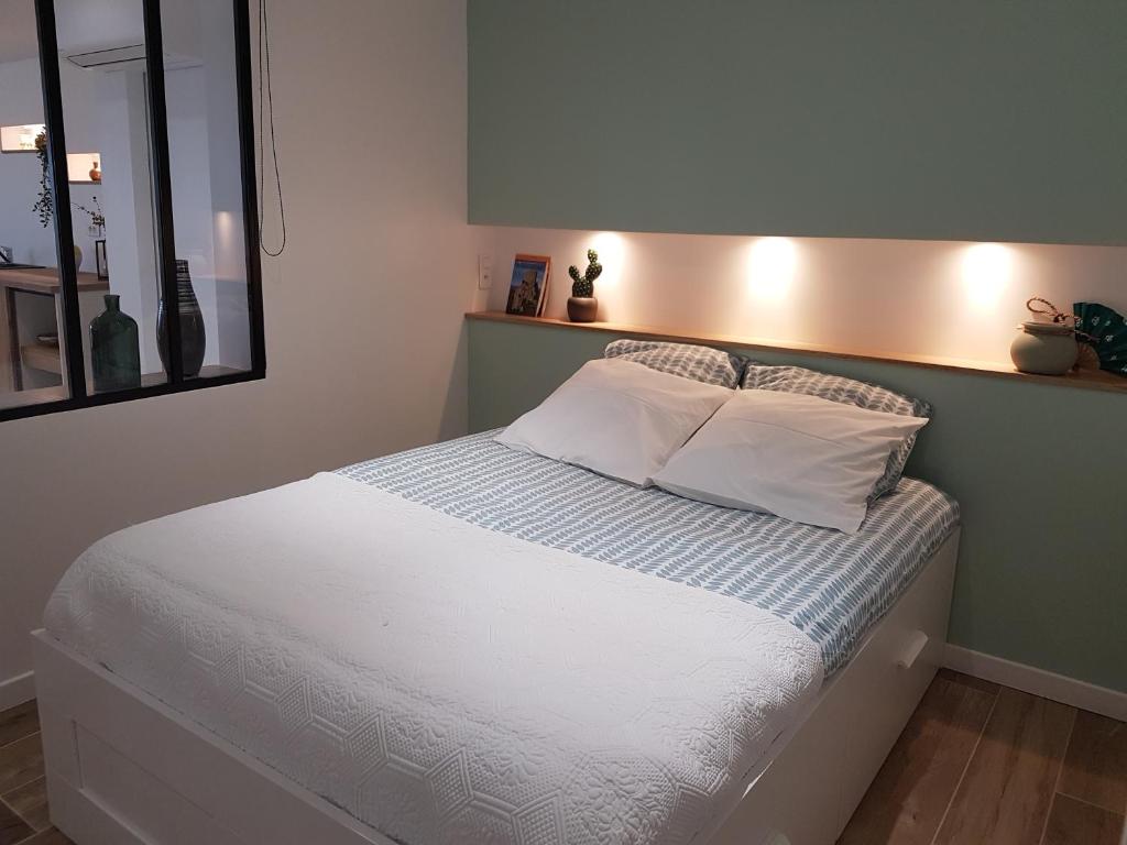 Postel nebo postele na pokoji v ubytování Gîte Las Colina