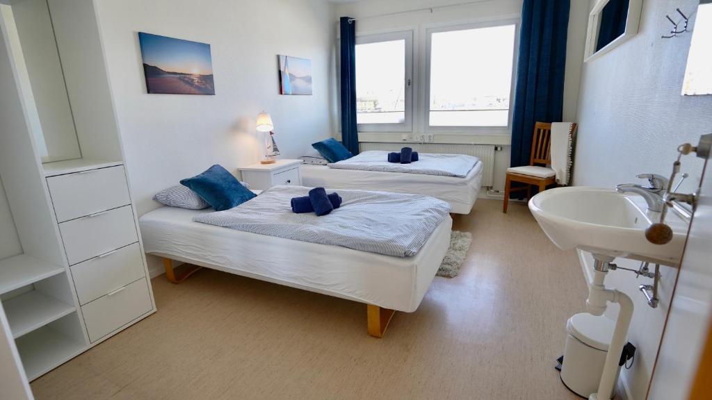 Postel nebo postele na pokoji v ubytování Henåns Hostel in the Marina