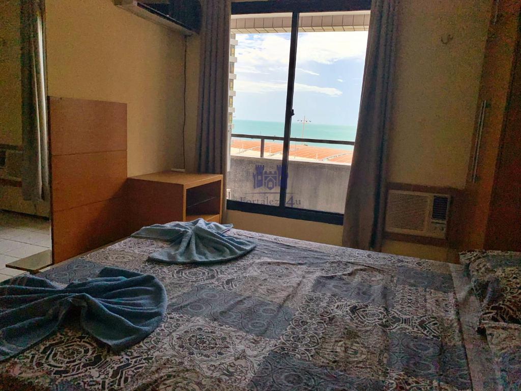  Apartamento com vista para o mar