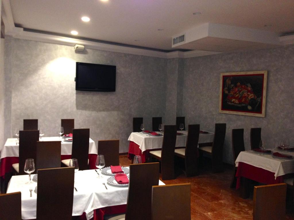 TV a/nebo společenská místnost v ubytování Hostal el Volao