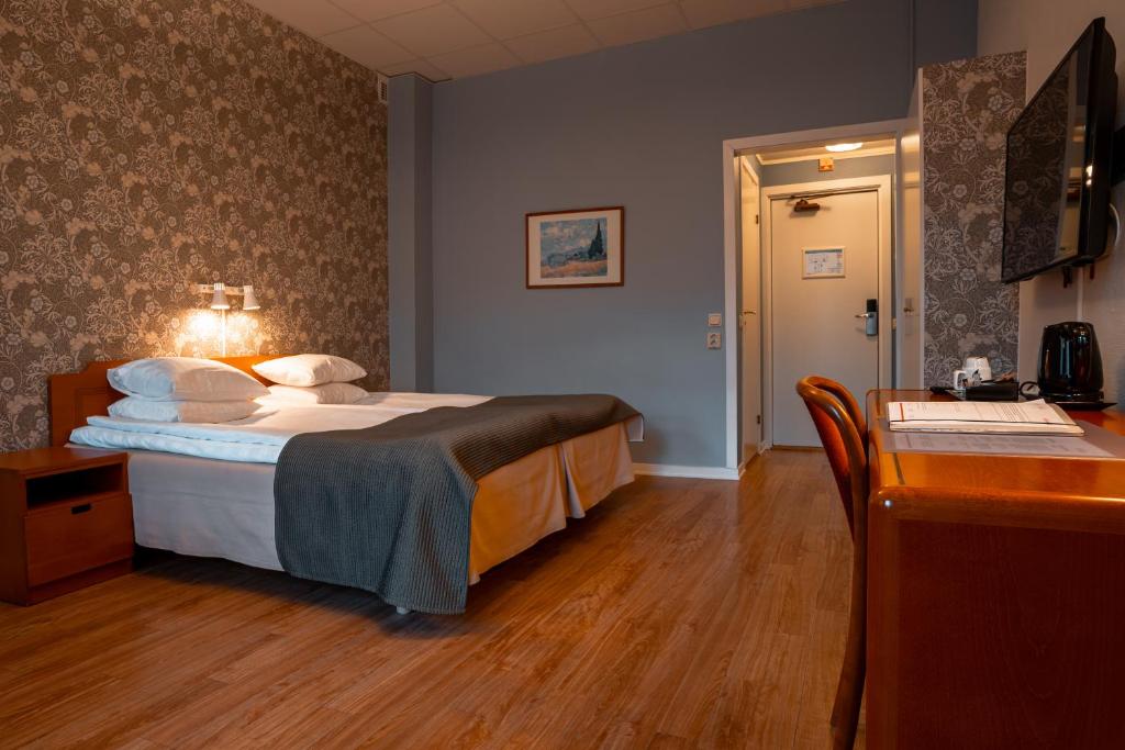 TV a/nebo společenská místnost v ubytování Hotel Lorensberg