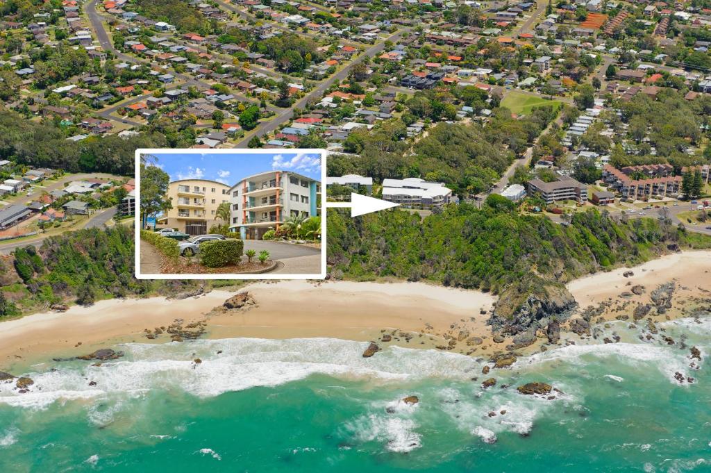 an aerial view of a beach with condos at Beach Resort Apartment in Port Macquarie