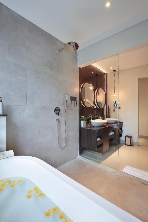 Postel nebo postele na pokoji v ubytování Sanctoo Suites & Villas