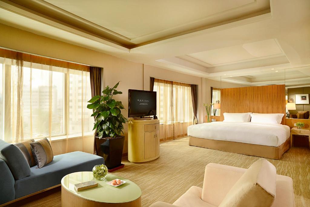 Postel nebo postele na pokoji v ubytování Sofitel Xi'an On Renmin Square