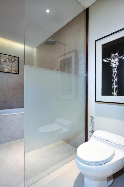 Koupelna v ubytování Sanctoo Suites & Villas