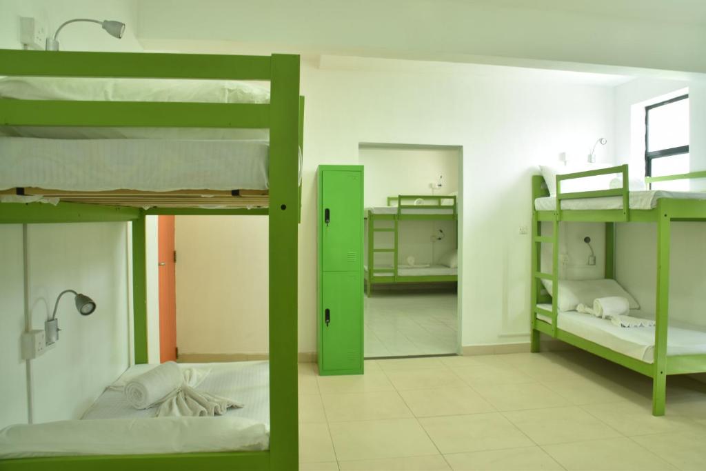 Postel nebo postele na pokoji v ubytování Hotel J Ambalangoda