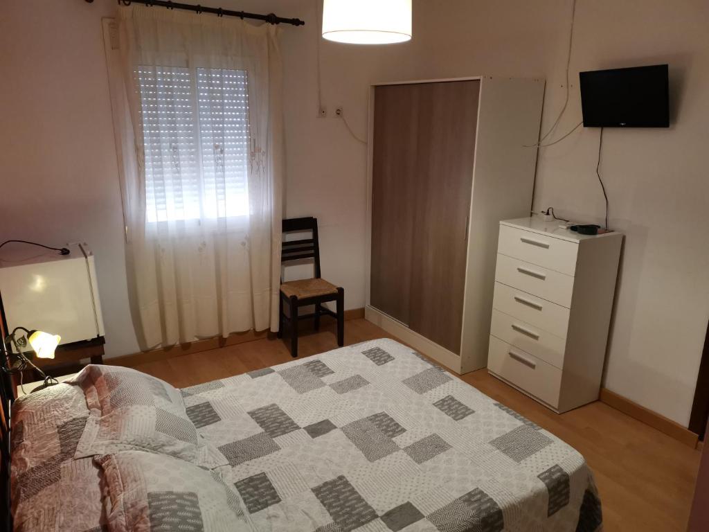 Posteľ alebo postele v izbe v ubytovaní Hotel Mesón El Número Uno