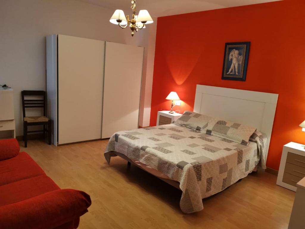 Posteľ alebo postele v izbe v ubytovaní Hotel Mesón El Número Uno