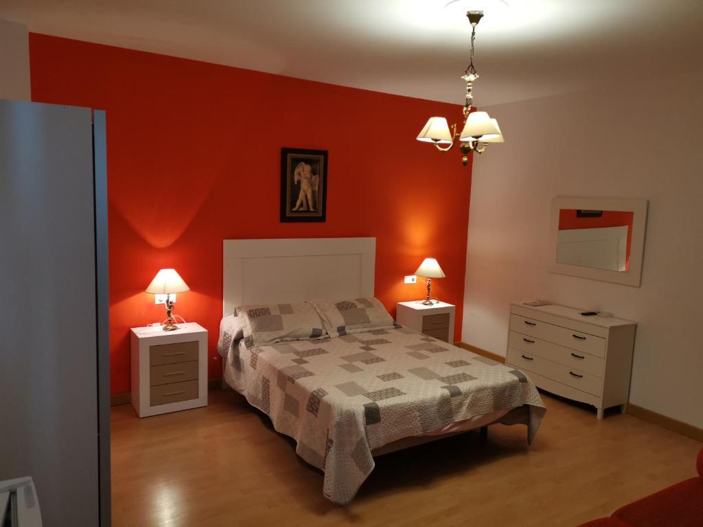 Posteľ alebo postele v izbe v ubytovaní Hotel Mesón El Número Uno