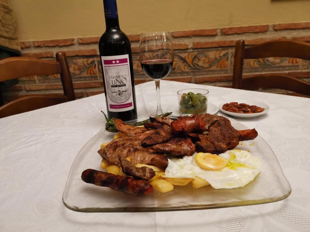 Nápoje v ubytovaní Hotel Mesón El Número Uno