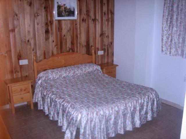 Postel nebo postele na pokoji v ubytování Alojamiento Rural Mirador del Avellano