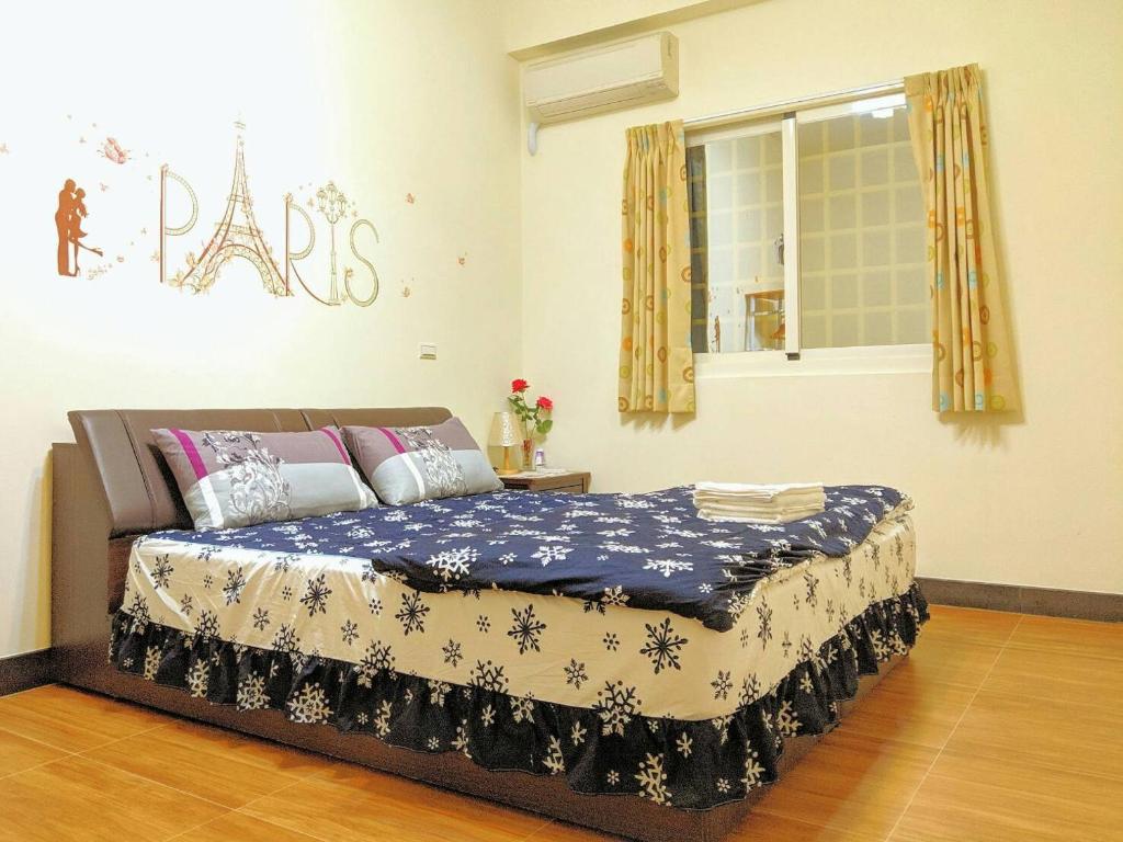Postel nebo postele na pokoji v ubytování Jin Xi Fu B&B