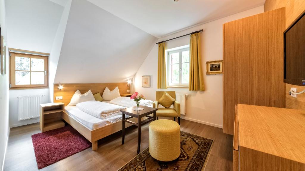 Postel nebo postele na pokoji v ubytování Hotel Brückenwirt