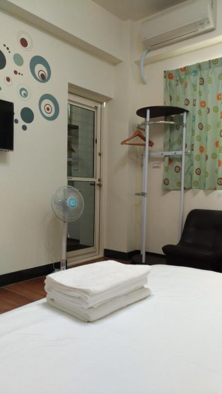 Postel nebo postele na pokoji v ubytování Jin Xi Fu B&B