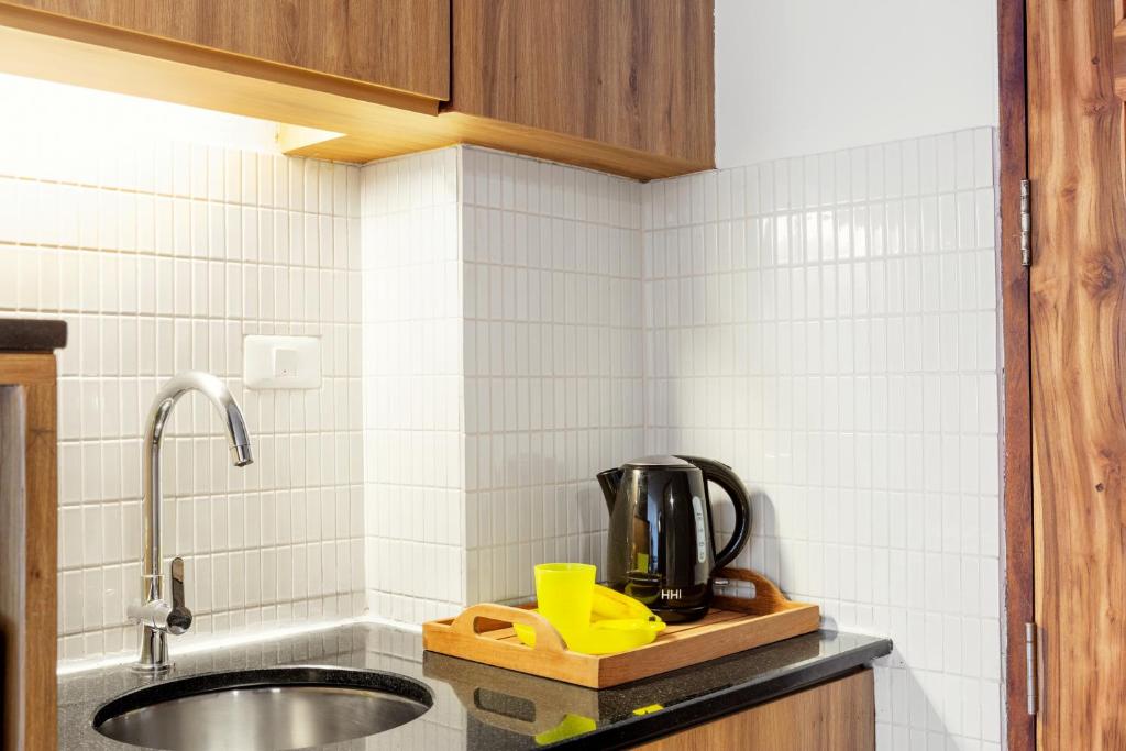Kuchyň nebo kuchyňský kout v ubytování Sunwing Kamala Beach