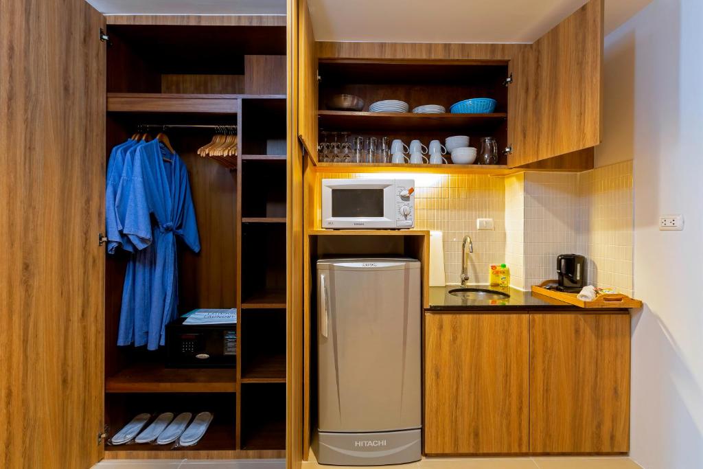 Kuchyň nebo kuchyňský kout v ubytování Sunwing Kamala Beach
