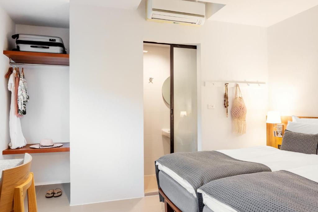 Postel nebo postele na pokoji v ubytování Sunwing Kamala Beach