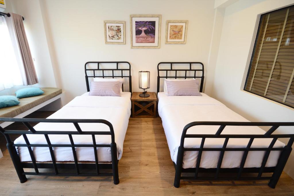 Postel nebo postele na pokoji v ubytování Hotel Toscana Trat