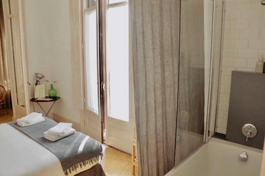 Postel nebo postele na pokoji v ubytování La Casa Gran B&B