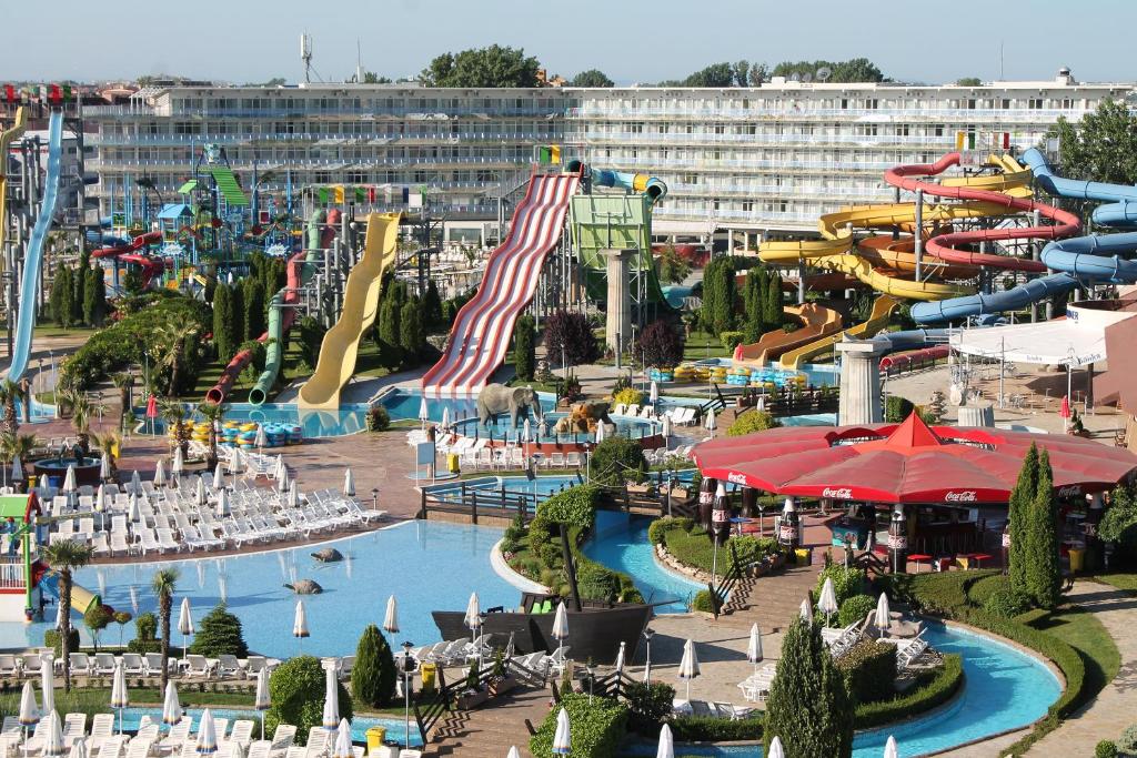 an amusement park with a water slide and slides at Aqua Nevis Hotel & Aqua Park - All Inclusive in Sunny Beach