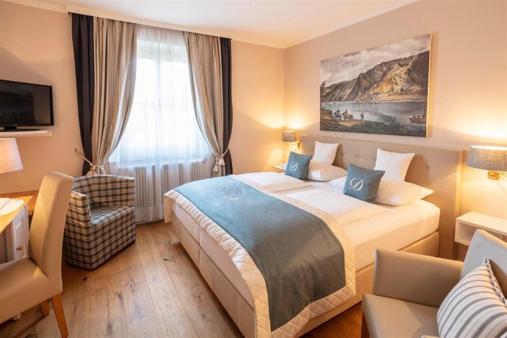 Voodi või voodid majutusasutuse Donauhof - Hotel garni toas