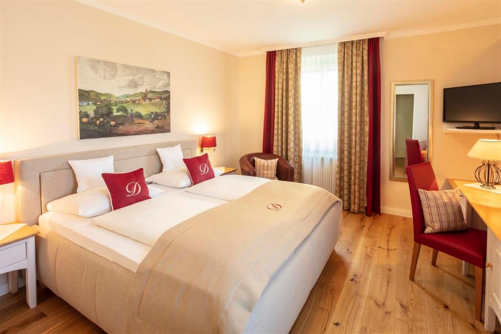 Voodi või voodid majutusasutuse Donauhof - Hotel garni toas