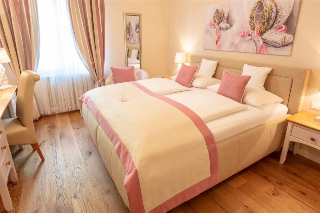 Voodi või voodid majutusasutuse Donauhof - Hotel garni toas