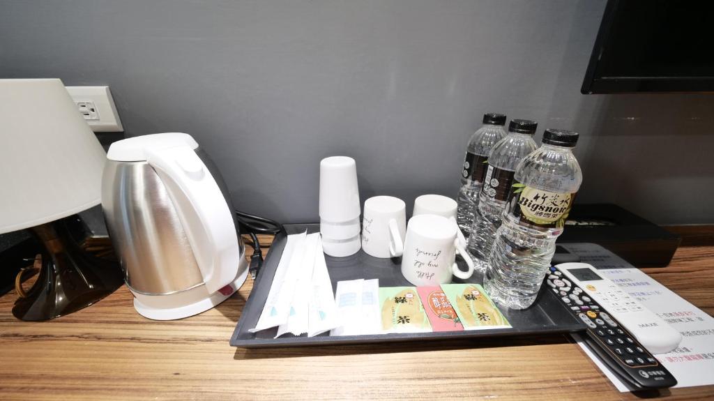 Příslušenství pro přípravu čaje a kávy v ubytování Apause Hotel