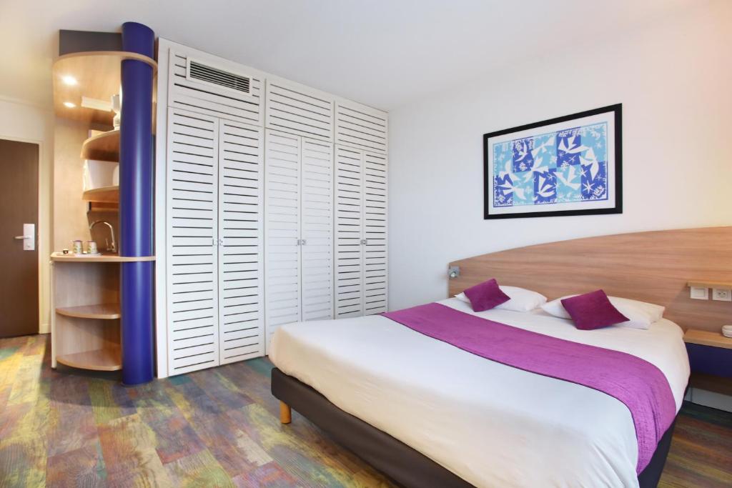 Postel nebo postele na pokoji v ubytování Suite-Home Orléans-Saran