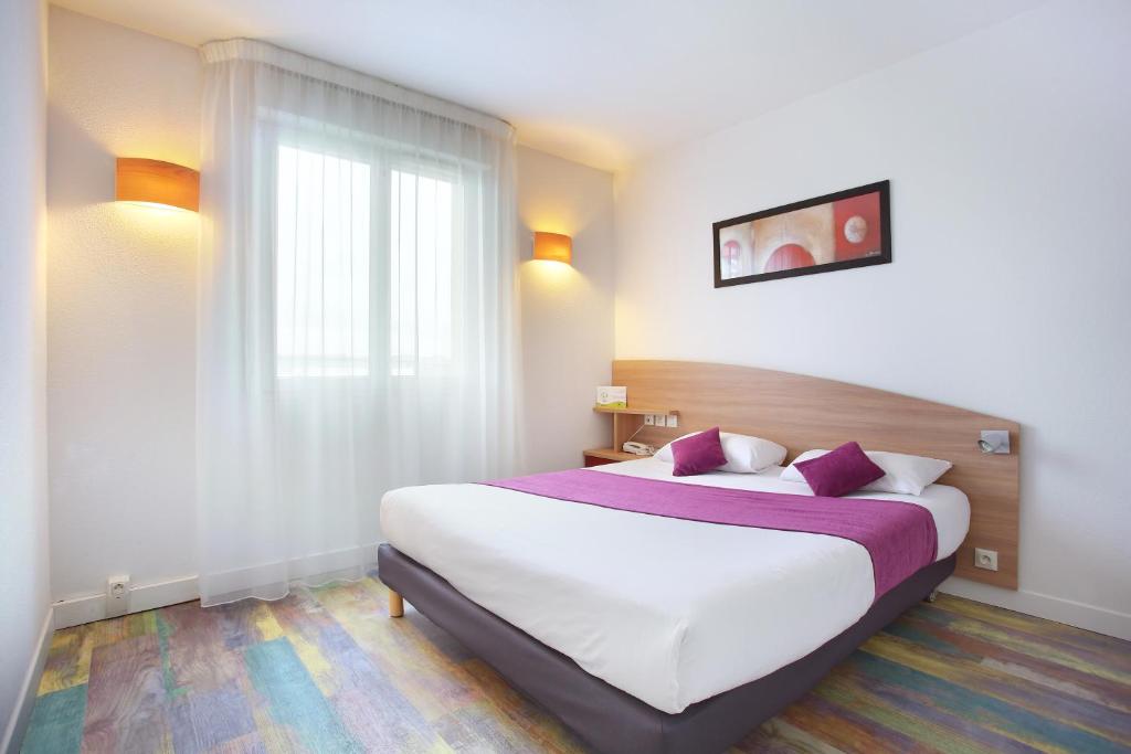 Postel nebo postele na pokoji v ubytování Suite-Home Orléans-Saran
