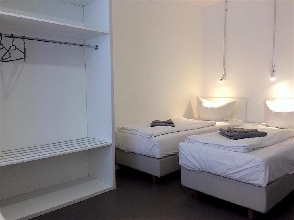 Postel nebo postele na pokoji v ubytování BNB near Brandenburg Gate - Rooms & Apartments