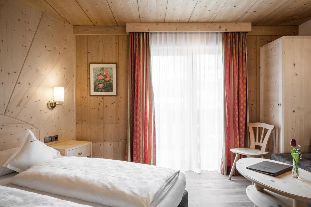 Postel nebo postele na pokoji v ubytování Hotel Digon