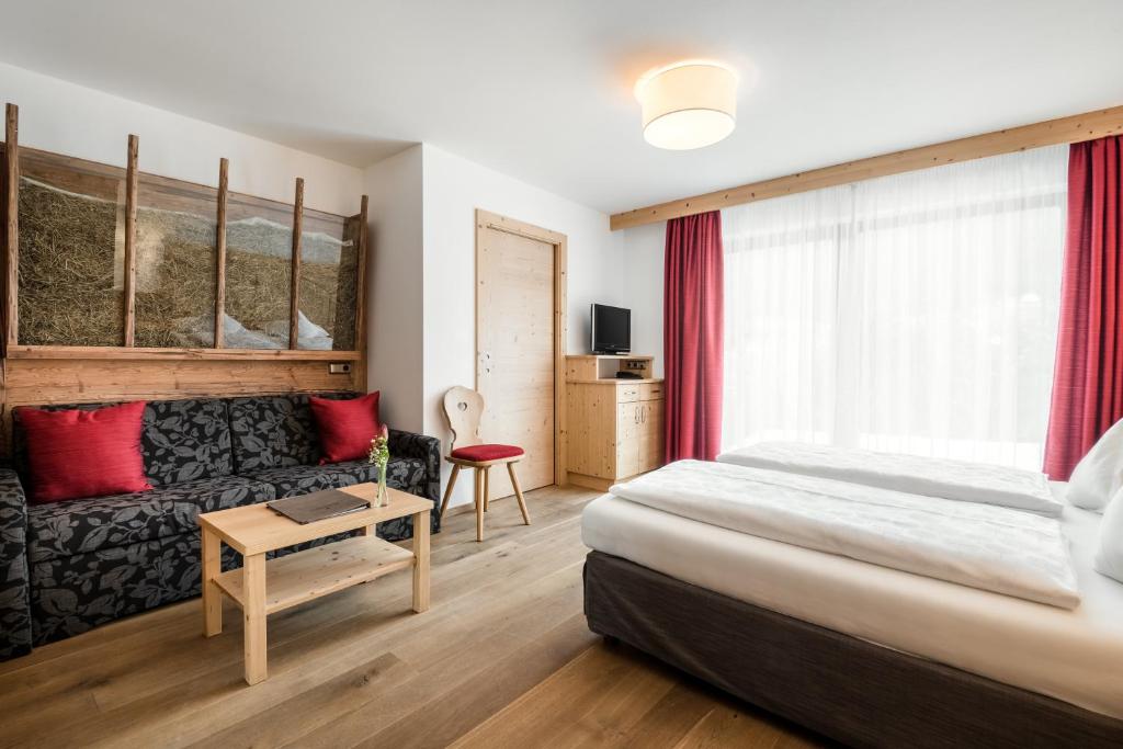 Postel nebo postele na pokoji v ubytování Hotel Digon