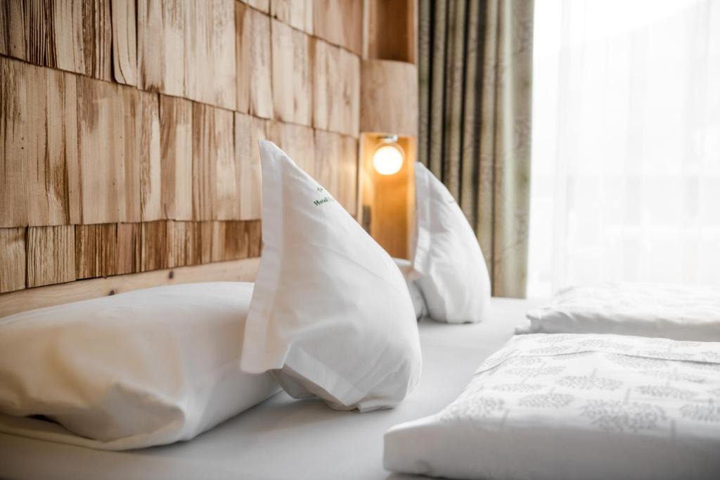 Postel nebo postele na pokoji v ubytování Hotel Digon