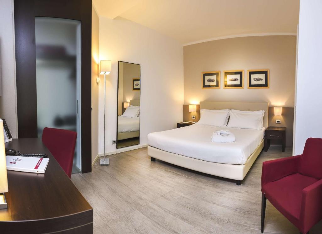 Łóżko lub łóżka w pokoju w obiekcie Best Western Plus Hotel Modena Resort