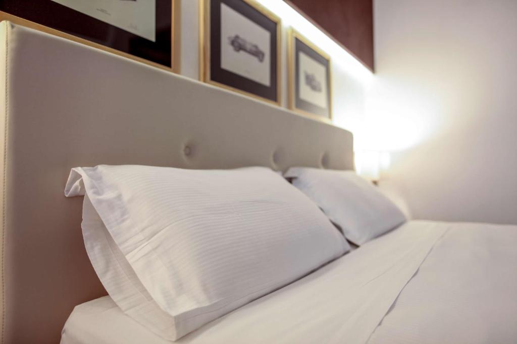 Łóżko lub łóżka w pokoju w obiekcie Best Western Plus Hotel Modena Resort