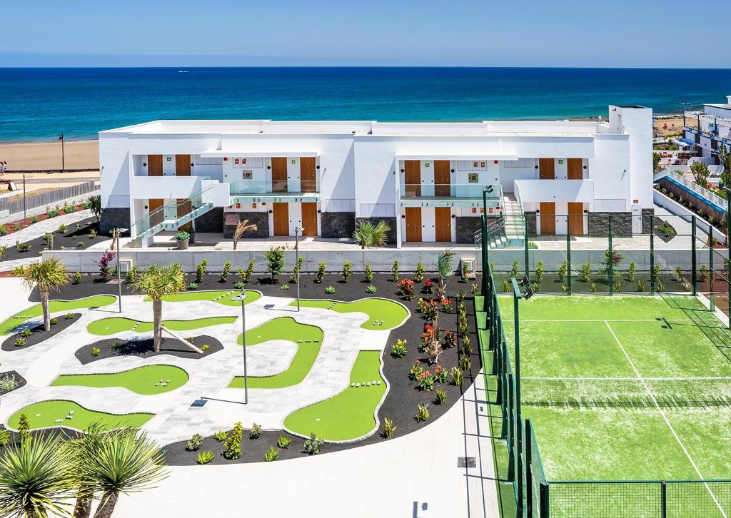 an aerial view of a resort with the beach at Hotel Lava Beach in Puerto del Carmen