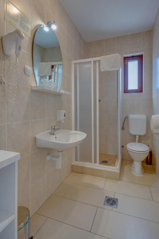 Koupelna v ubytování Hotel Galia
