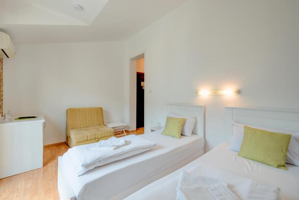 Postel nebo postele na pokoji v ubytování Hotel Galia