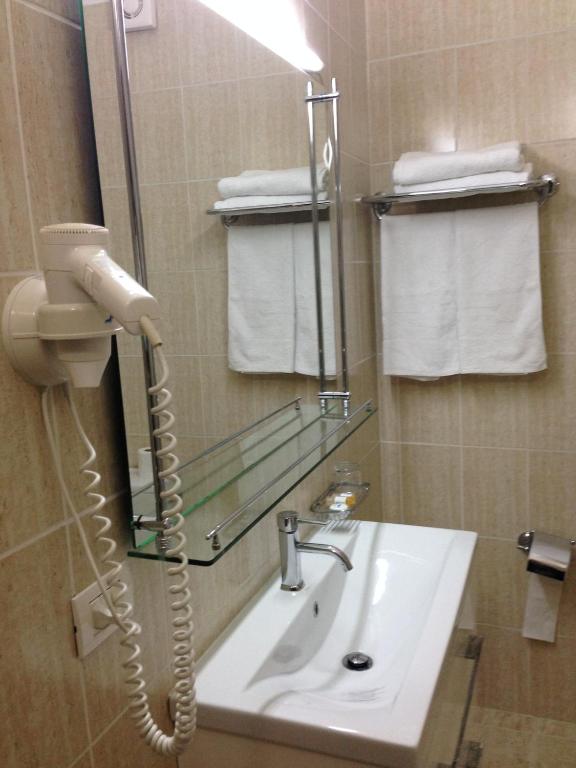 Koupelna v ubytování Hotel Arvi
