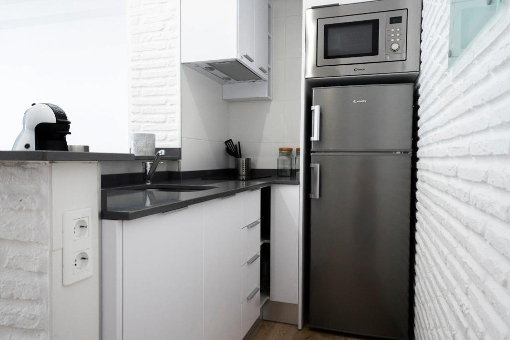 Kuchyň nebo kuchyňský kout v ubytování Rio de Janeiro Beach - Apartamento a estrenar en primera linea de playa