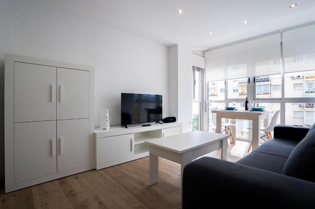 TV a/nebo společenská místnost v ubytování Rio de Janeiro Beach - Apartamento a estrenar en primera linea de playa