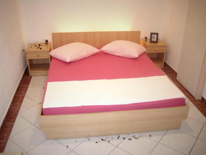 Postel nebo postele na pokoji v ubytování Apartments Mare