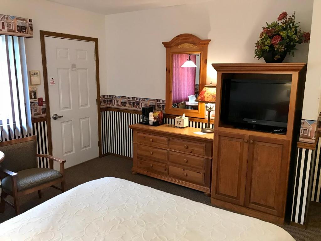 Postel nebo postele na pokoji v ubytování Main Street Motel