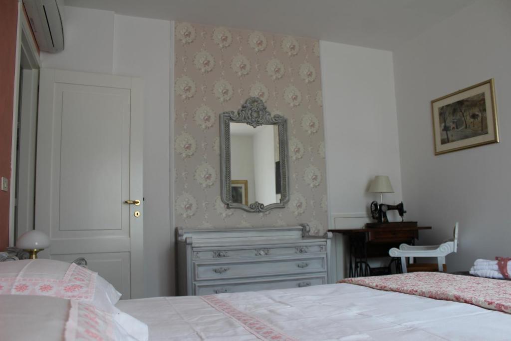 Łóżko lub łóżka w pokoju w obiekcie B&B Villa Lilla